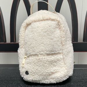 Zella Mini Cream Faux Shearling Backpack